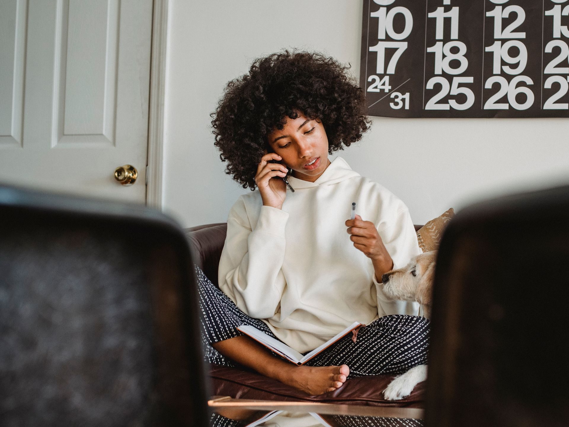 A woman at home on a phone call